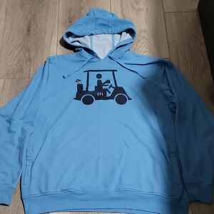 Travis Mathew Light Blue Hoodie with Golf Cart Graphic